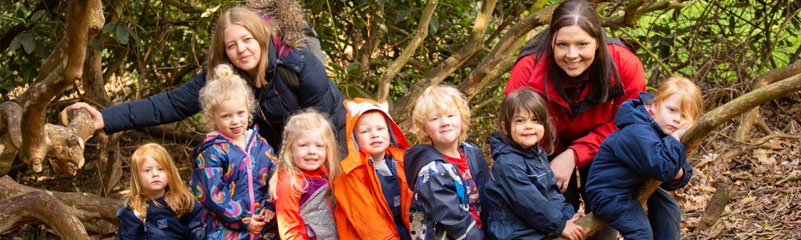 group of children with staff members outdoors